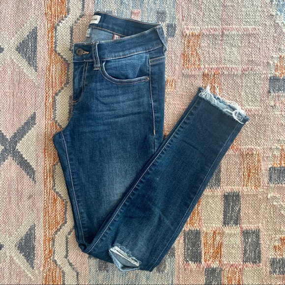 Sneak Peek Denim - Low rise knee slit jeans